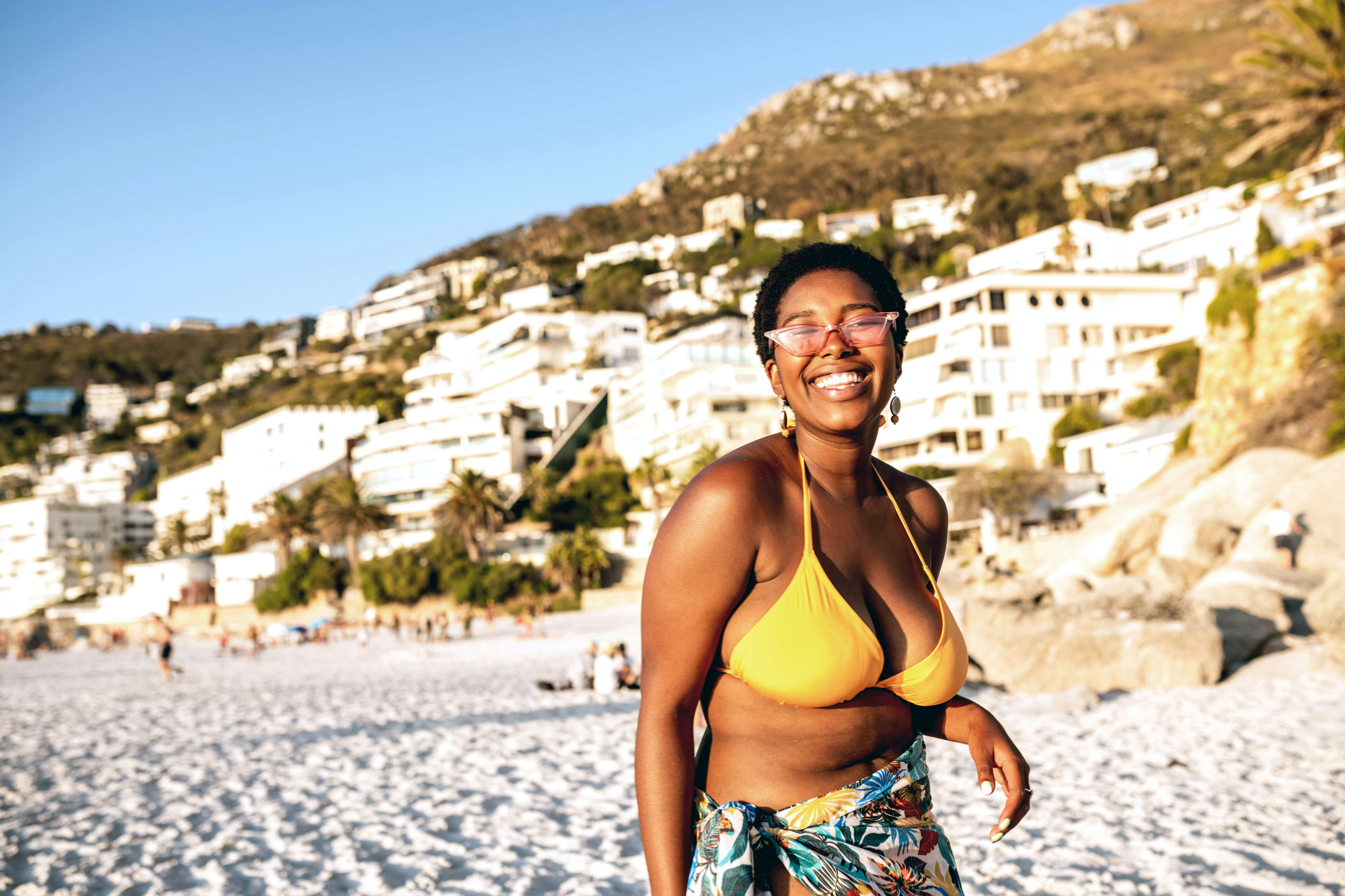 Portrait of a confident African woman at the beach, South Africa.
